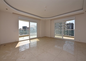 Трехкомнатная квартира в районе Махмутлар