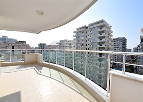 Трехкомнатная квартира в районе Махмутлар