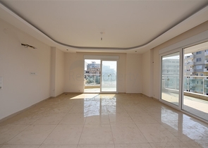 Трехкомнатная квартира в районе Махмутлар