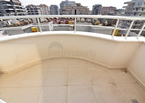 Трехкомнатная квартира в районе Махмутлар