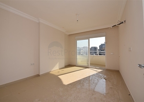 Трехкомнатная квартира в районе Махмутлар