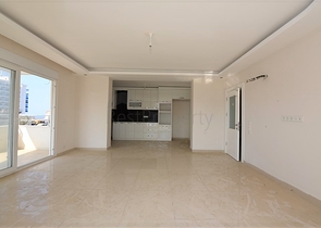 Трехкомнатная квартира в районе Махмутлар