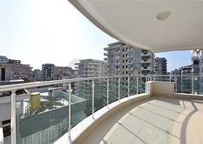 Трехкомнатная квартира в районе Махмутлар