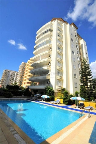 Трехкомнатная квартира в районе Махмутлар