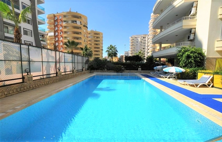 Трехкомнатная квартира в районе Махмутлар