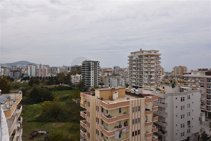 Трехкомнатная квартира в районе Махмутлар