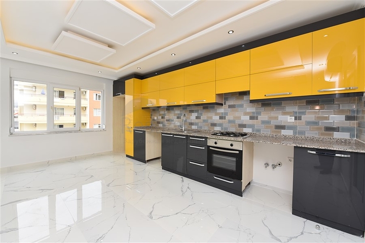 Трехкомнатная квартира в районе Махмутлар