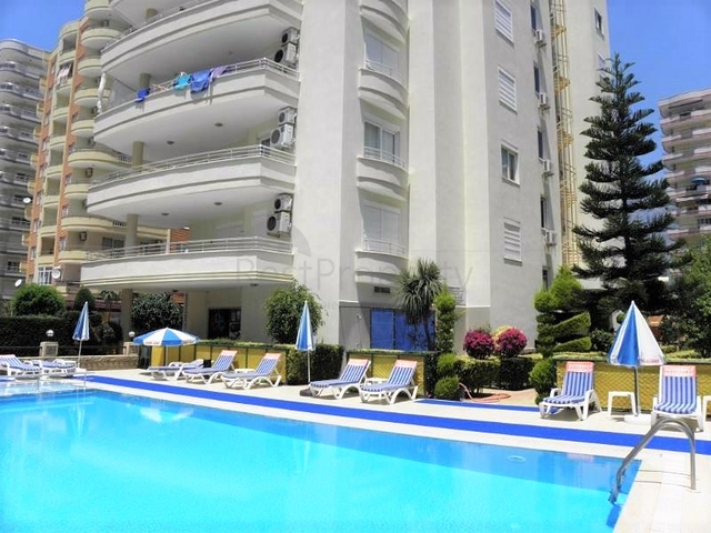 Трехкомнатная квартира в районе Махмутлар