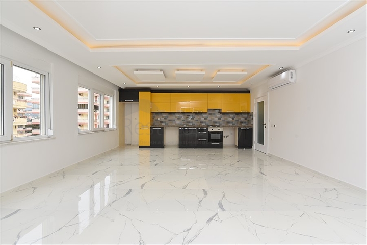 Трехкомнатная квартира в районе Махмутлар