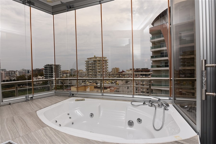 Трехкомнатная квартира в районе Махмутлар