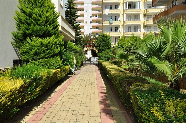 Трехкомнатная квартира в районе Махмутлар