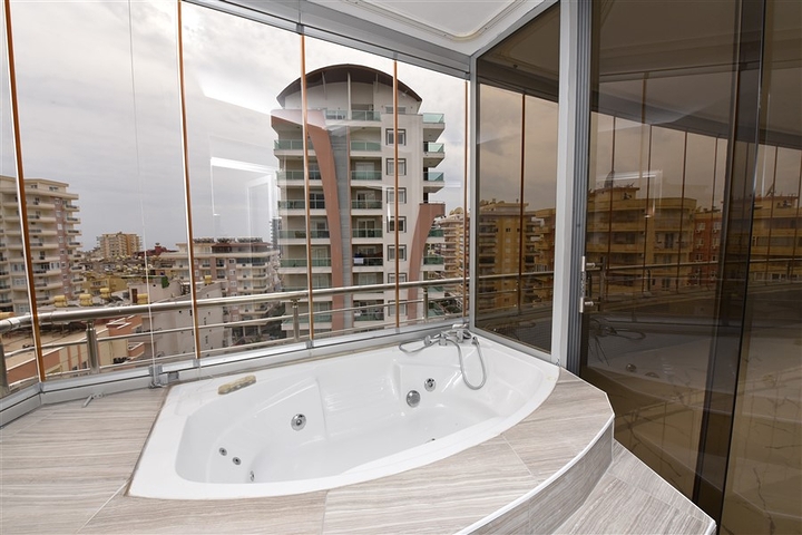 Трехкомнатная квартира в районе Махмутлар