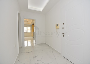 Трехкомнатная квартира в районе Махмутлар