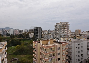 Трехкомнатная квартира в районе Махмутлар