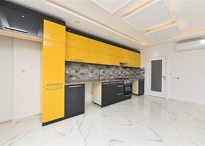 Трехкомнатная квартира в районе Махмутлар