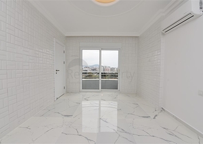 Трехкомнатная квартира в районе Махмутлар