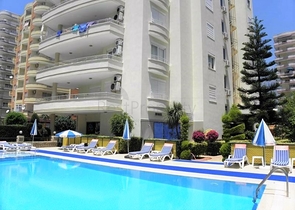 Трехкомнатная квартира в районе Махмутлар