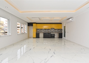 Трехкомнатная квартира в районе Махмутлар