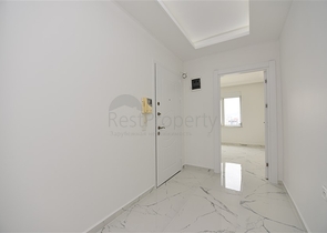 Трехкомнатная квартира в районе Махмутлар