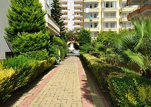 Трехкомнатная квартира в районе Махмутлар