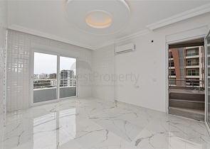 Трехкомнатная квартира в районе Махмутлар