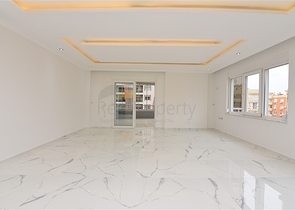 Трехкомнатная квартира в районе Махмутлар