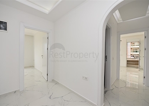 Трехкомнатная квартира в районе Махмутлар