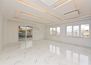 Трехкомнатная квартира в районе Махмутлар