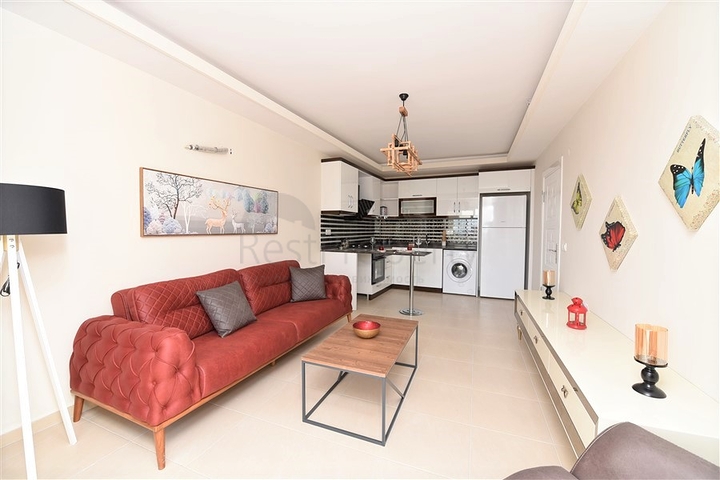 Двухкомнатная квартира с мебелью в Махмутларе 