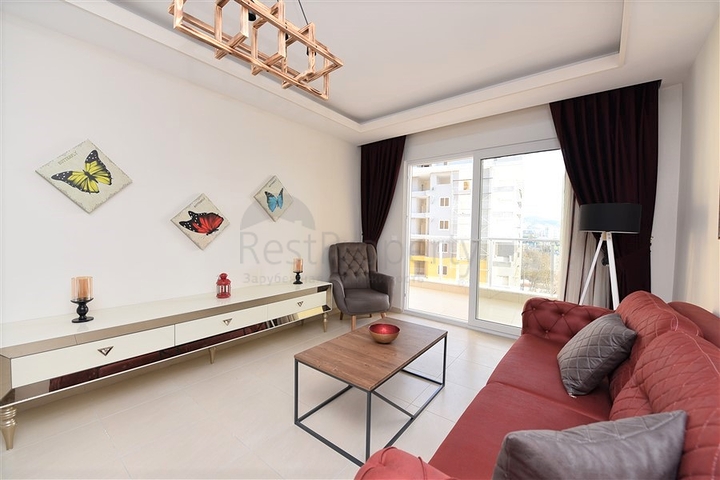 Двухкомнатная квартира с мебелью в Махмутларе 