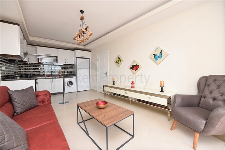 Двухкомнатная квартира с мебелью в Махмутларе 