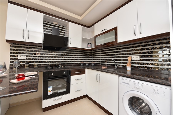 Двухкомнатная квартира с мебелью в Махмутларе 