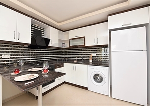 Двухкомнатная квартира с мебелью в Махмутларе 