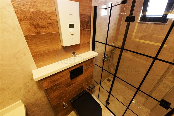 Квартира планировка 3+1 с видом на порт в центре Алании