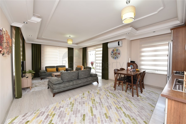 Трехкомнатная квартира с мебелью в Махмутларе.