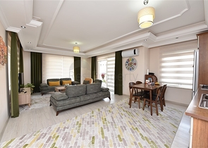 Трехкомнатная квартира с мебелью в Махмутларе.