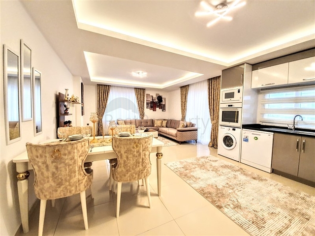 Меблированная квартира с двумя спальнями в Махмутларе