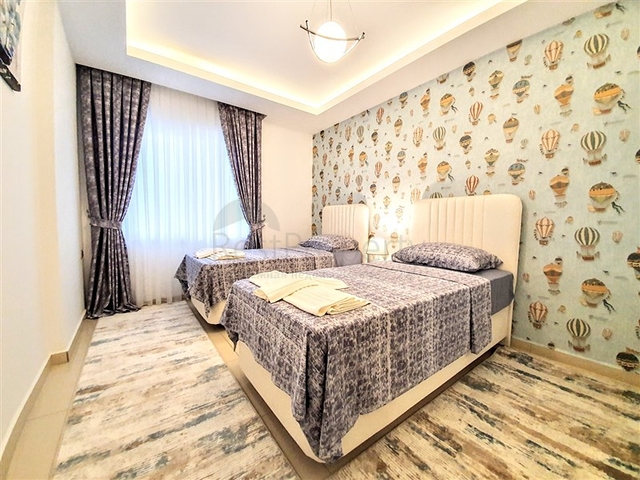 Меблированная квартира с двумя спальнями в Махмутларе