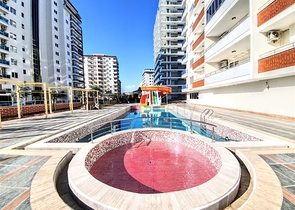 Меблированная квартира с двумя спальнями в Махмутларе