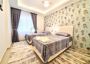 Меблированная квартира с двумя спальнями в Махмутларе