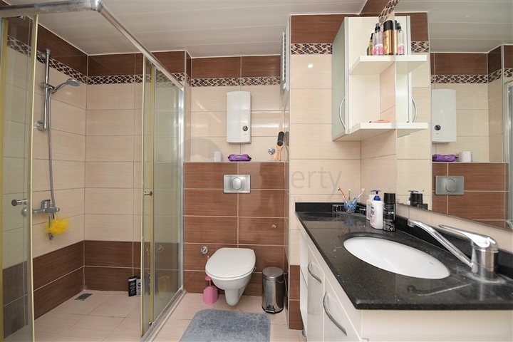 Меблированная квартира с тремя спальнями в Авсалларе