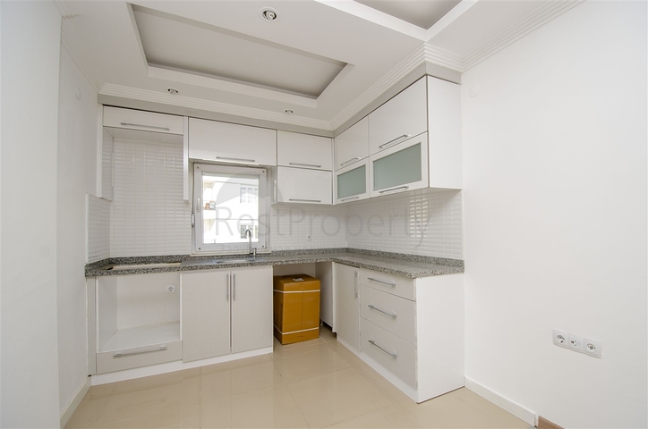 Трехкомнатная квартира в микрорайоне Хурма Коньяалты Анталья