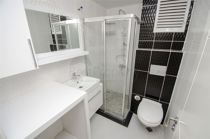 Трехкомнатная квартира в микрорайоне Хурма Коньяалты Анталья