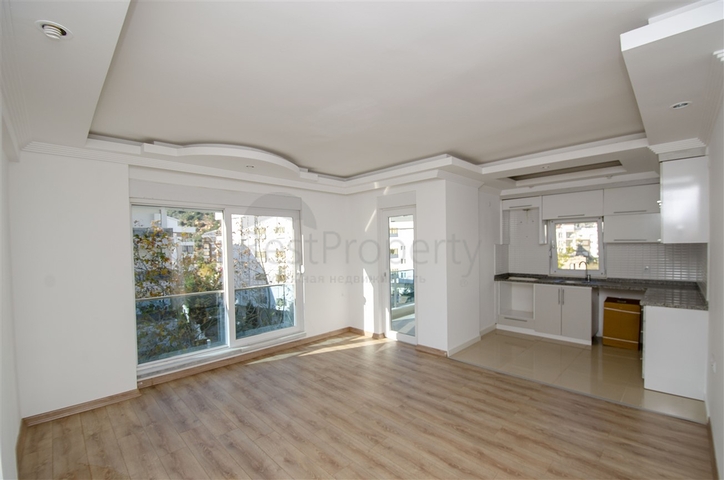 Трехкомнатная квартира в микрорайоне Хурма Коньяалты Анталья