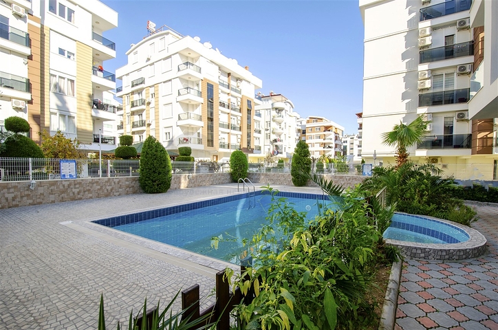 Трехкомнатная квартира в микрорайоне Хурма Коньяалты Анталья