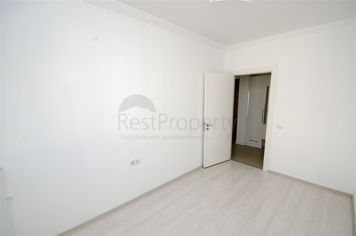 Трехкомнатная квартира в микрорайоне Хурма Коньяалты Анталья