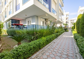 Трехкомнатная квартира в микрорайоне Хурма Коньяалты Анталья