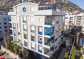 Трехкомнатная квартира в микрорайоне Хурма Коньяалты Анталья