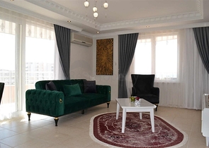 Меблированная квартира с двумя спальнями в Махмутларе