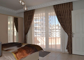 Меблированная квартира с двумя спальнями в Махмутларе